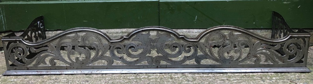 highly decorative c19th cutsteel fireplace guard or fender in the mid c18th georgian period revival style