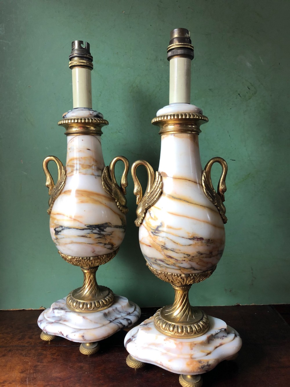 pair of early c20th french marble and ormolumounted lamp bases in the louis xvi style