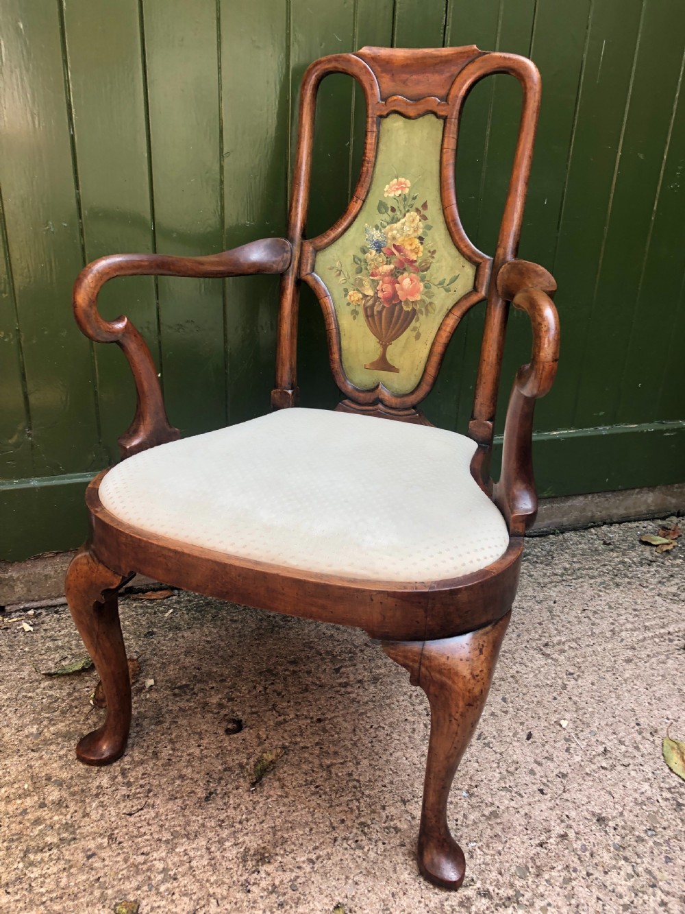 early c20th queen anne revival walnut armchair with a decorative painted splat back