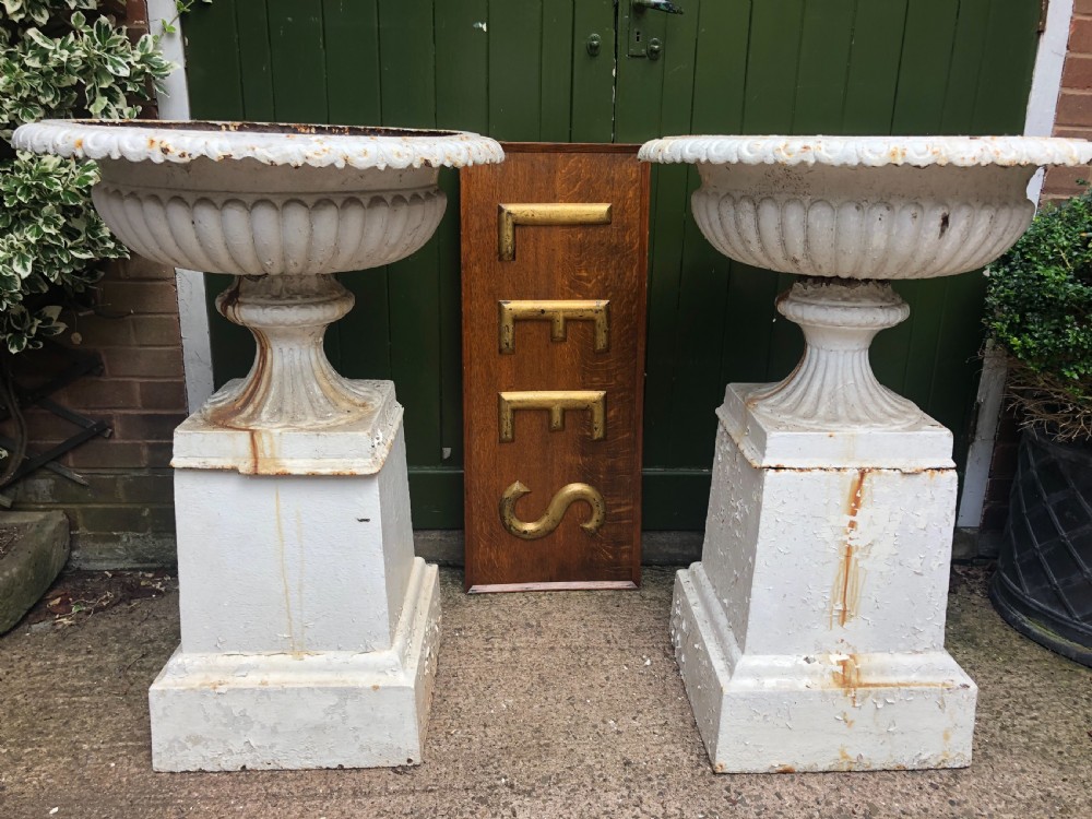 pair of impressive early c19th castiron terrace or garden vases of imposing scale