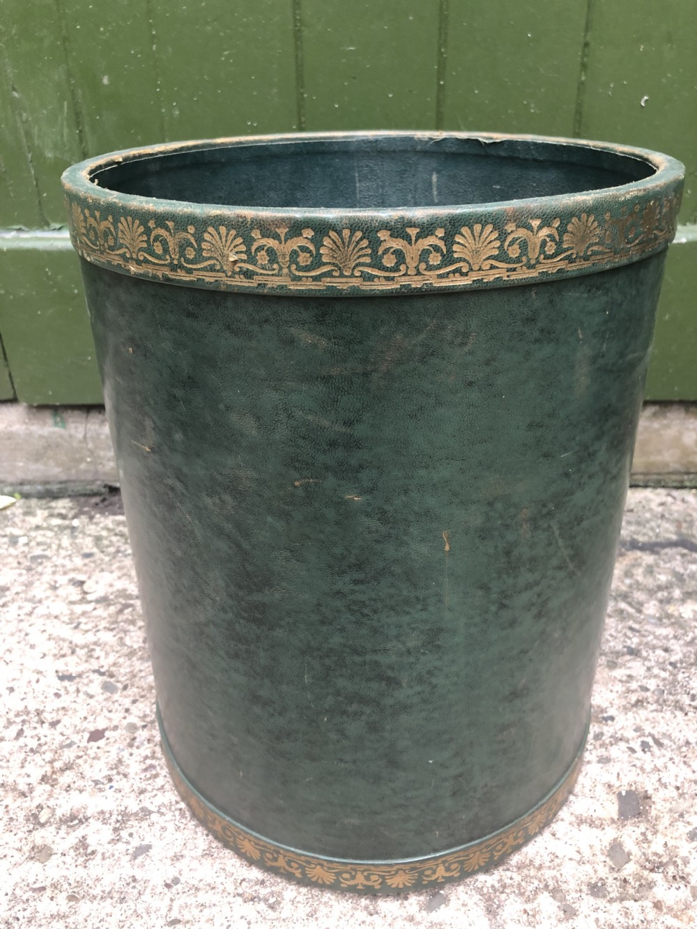 early c20th green leather and gilttooled circular wastepaper bin or bucket