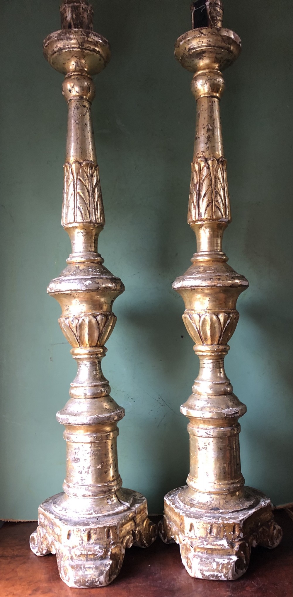 pair of tall late c18th early c19th italian venetianstyle giltwood and silvered mecca altartype candlesticks