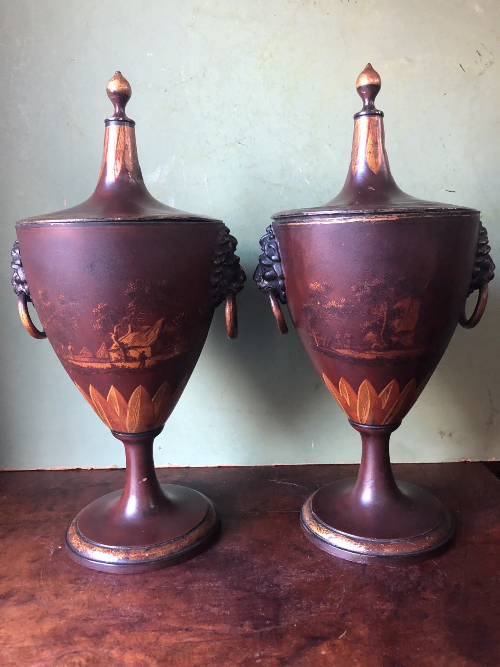pair of early c19th dutch japanned pewter chestnut urns of neoclassical design
