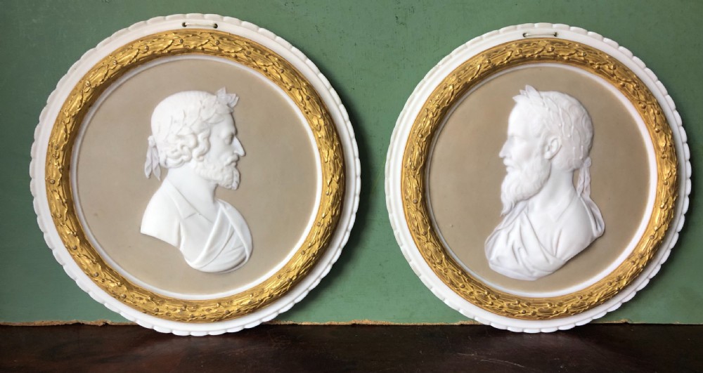 pair of late c19th italian bisque porcelain portrait roundels or tondos of renaissance poets