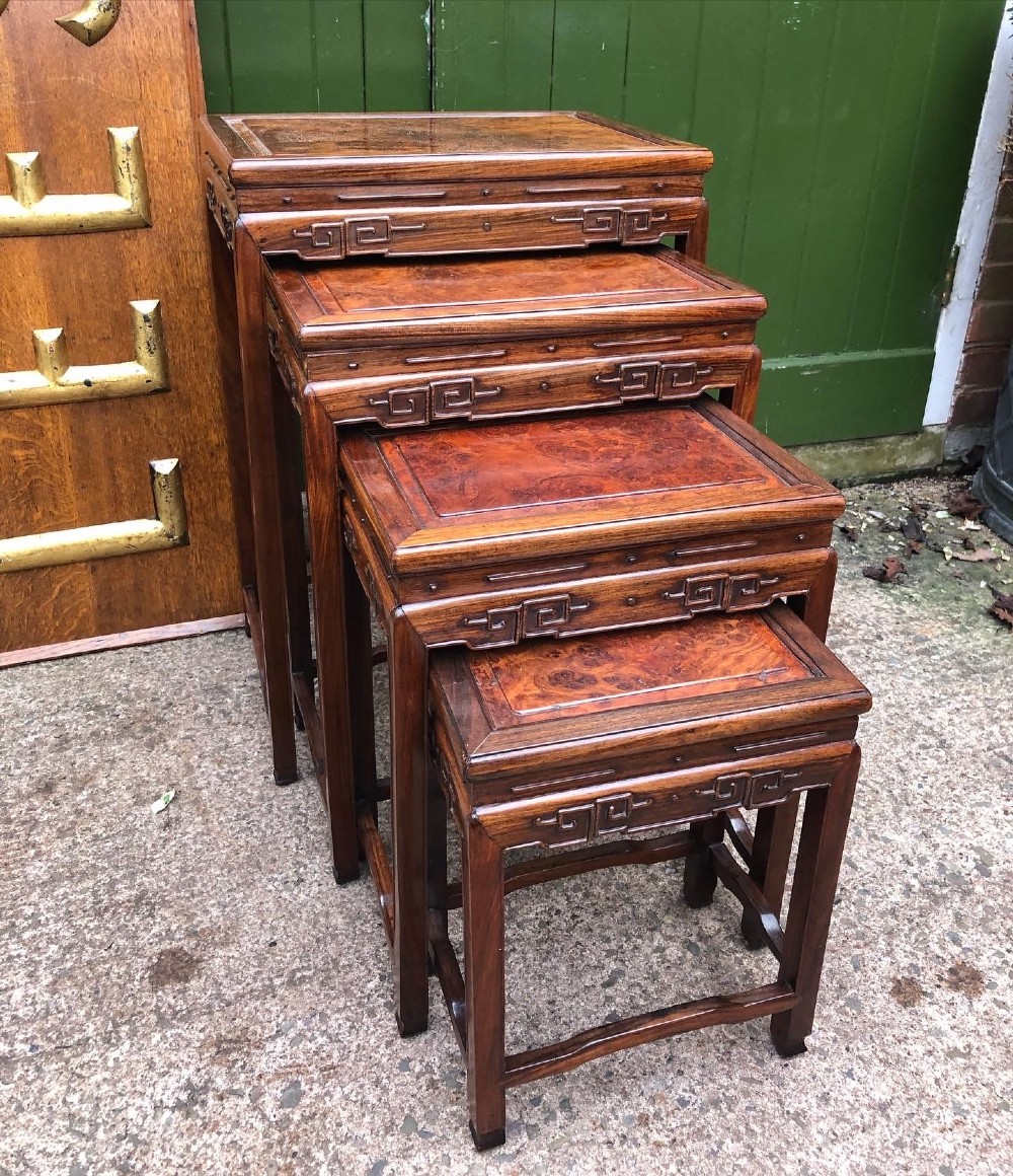 late c19th early c20th chinese qing dynasty carved hardwood and burr thuya graduated quartetto of tables