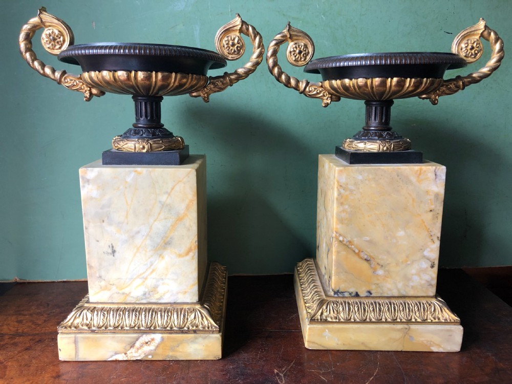 pair of early c19th french charles x period bronze ormolu and giallo antico marble tazzas