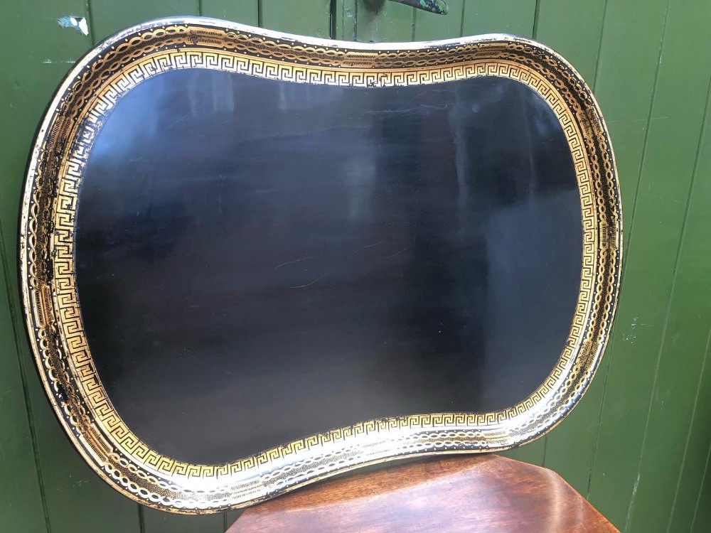 large mid c19th kidneyshaped papiermch tray with gilded border