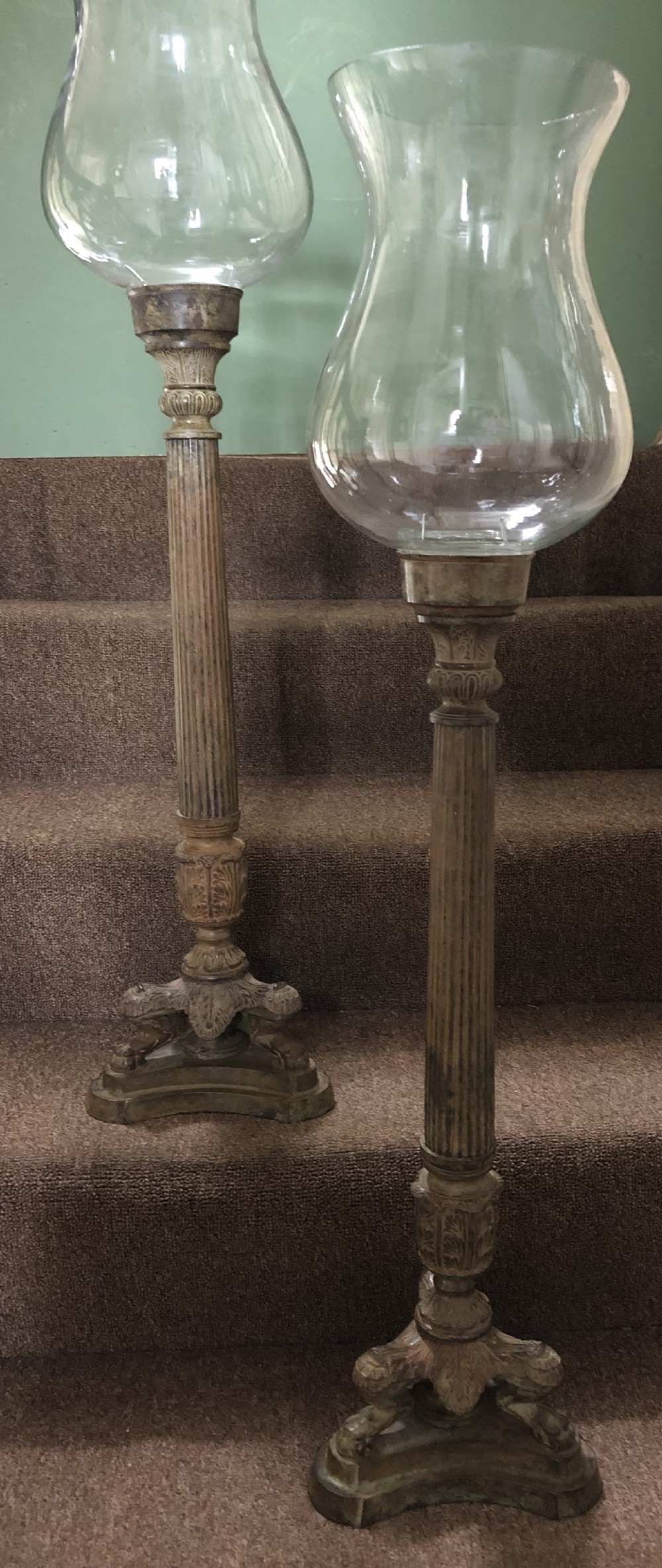 pair of large late c19th french empirestyle patinated castiron candlesticks with glass hurricane or storm shades