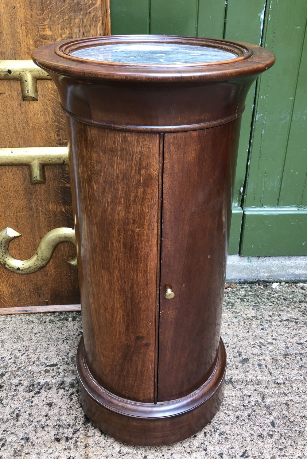 early c19th french empire period mahogany cylindrical pedestal cupboard