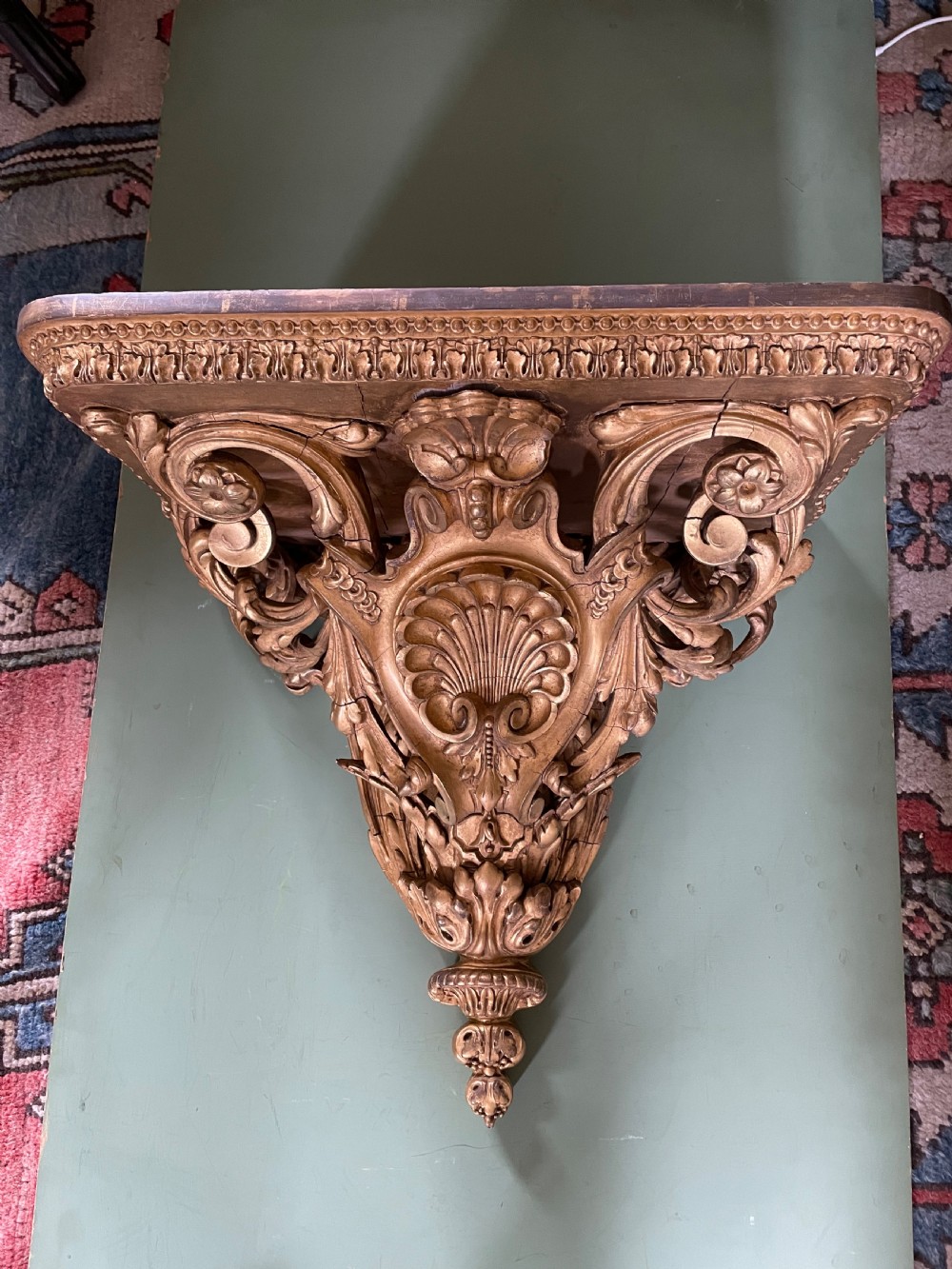 a large scale late c19th french rococostyle giltwood and gilded gesso wall bracket in the louis xvi taste