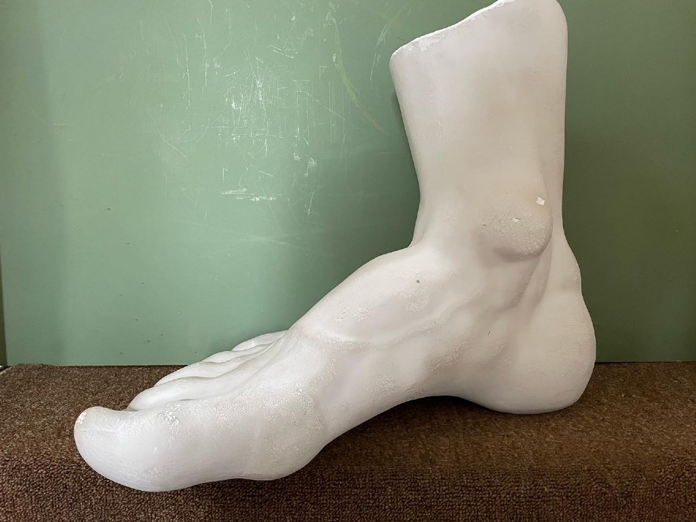 a large late c19th french cast plaster study of the foot and ankle of the farnese hercules