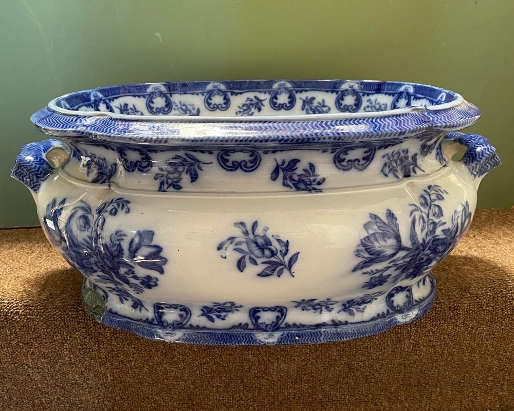 mid c19th staffordshire china footbath decorated in flow blue floral pattern by copeland and garrett