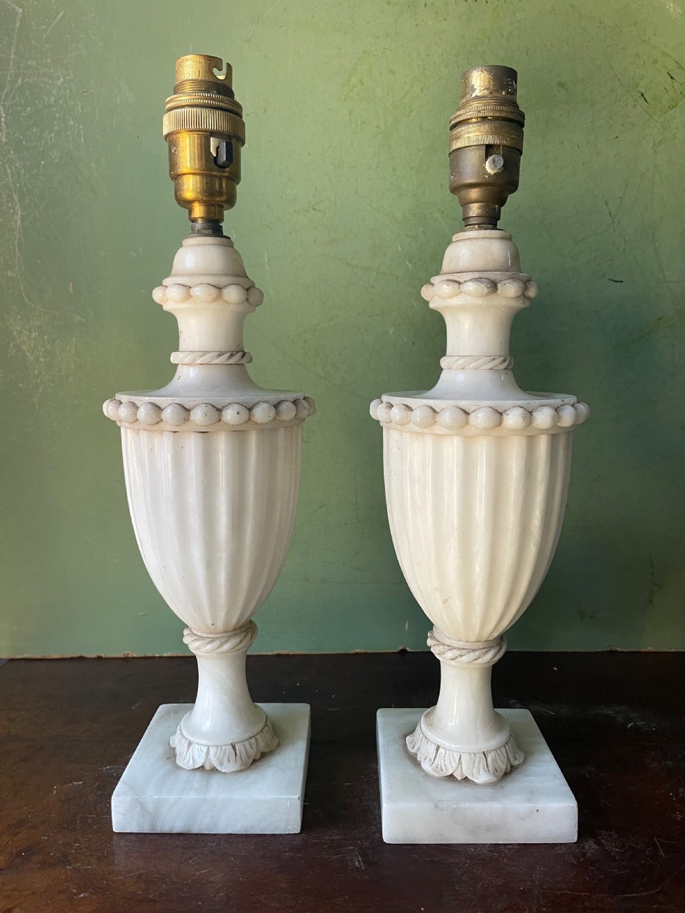 pair of early c20th italian carved alabaster lamp bases of neoclassical design