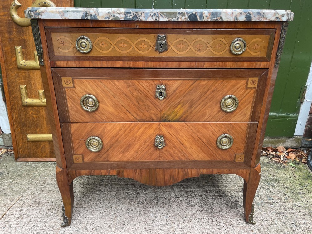 late c19th french walnut satinwood rosewood tulipwood and kingwood marbletopped commode of louis xvi period design