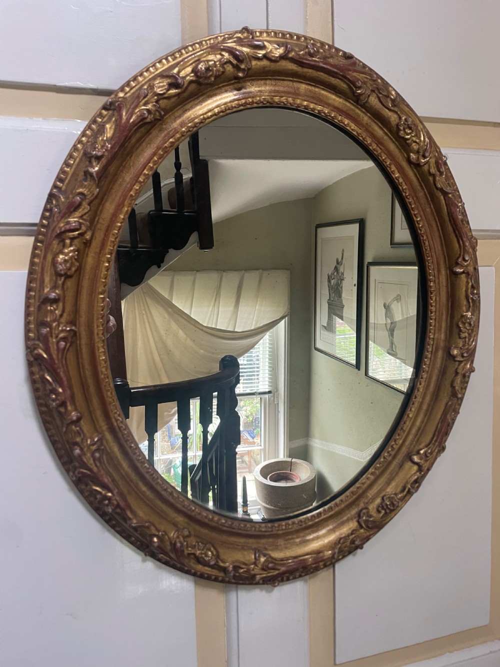 c19th carved giltwood frame oval mirror