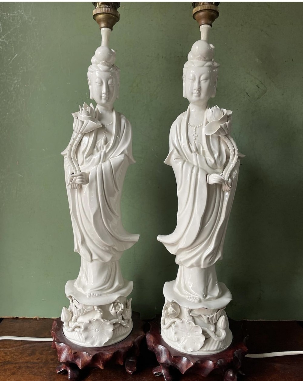 pair of early c20th chinese dehua or blanc de chine porcelain figures of guanyin mounted as lamps