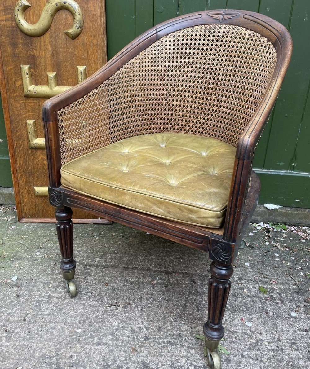 early c19th regency period simulated or faux rosewood framed bergere library armchair