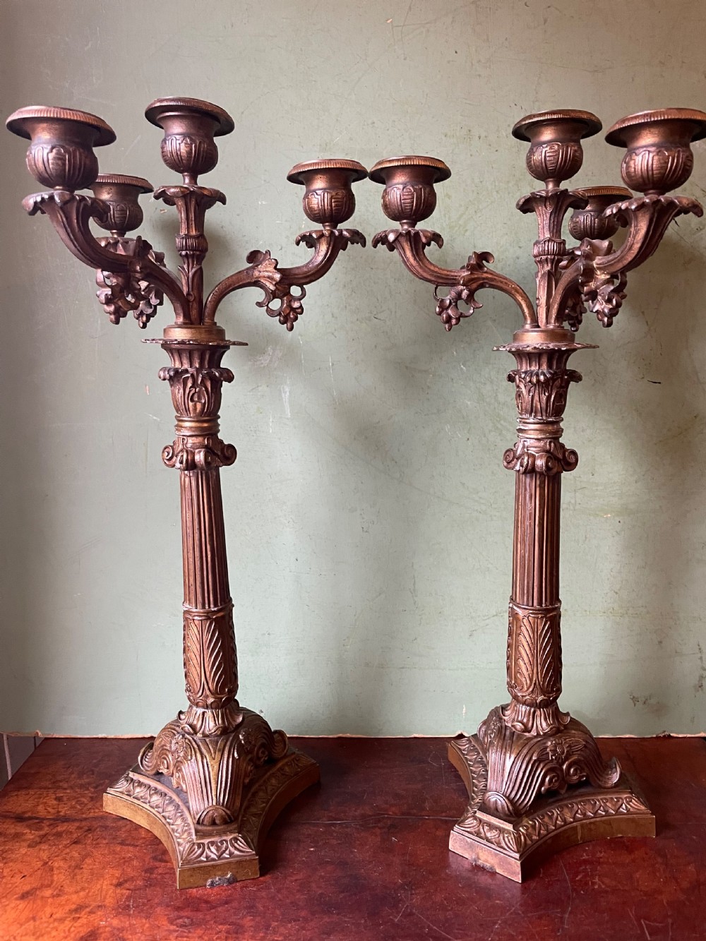 pair of early c19th french charles x period bronze candelabras