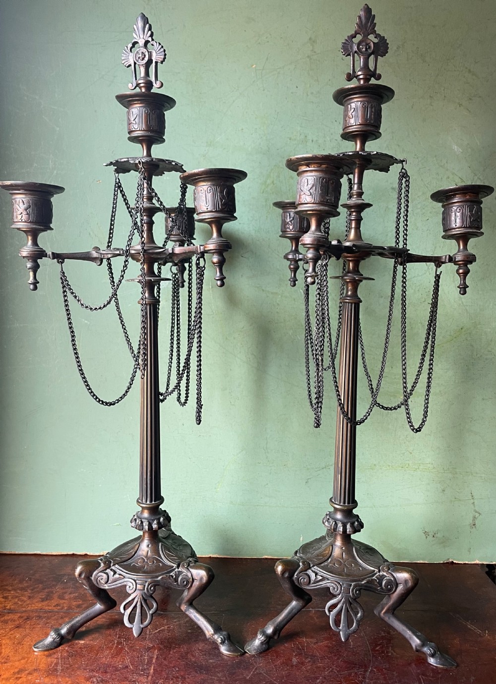 pair of late c19th french bronze candelabras in the ancient roman or pompeiian style