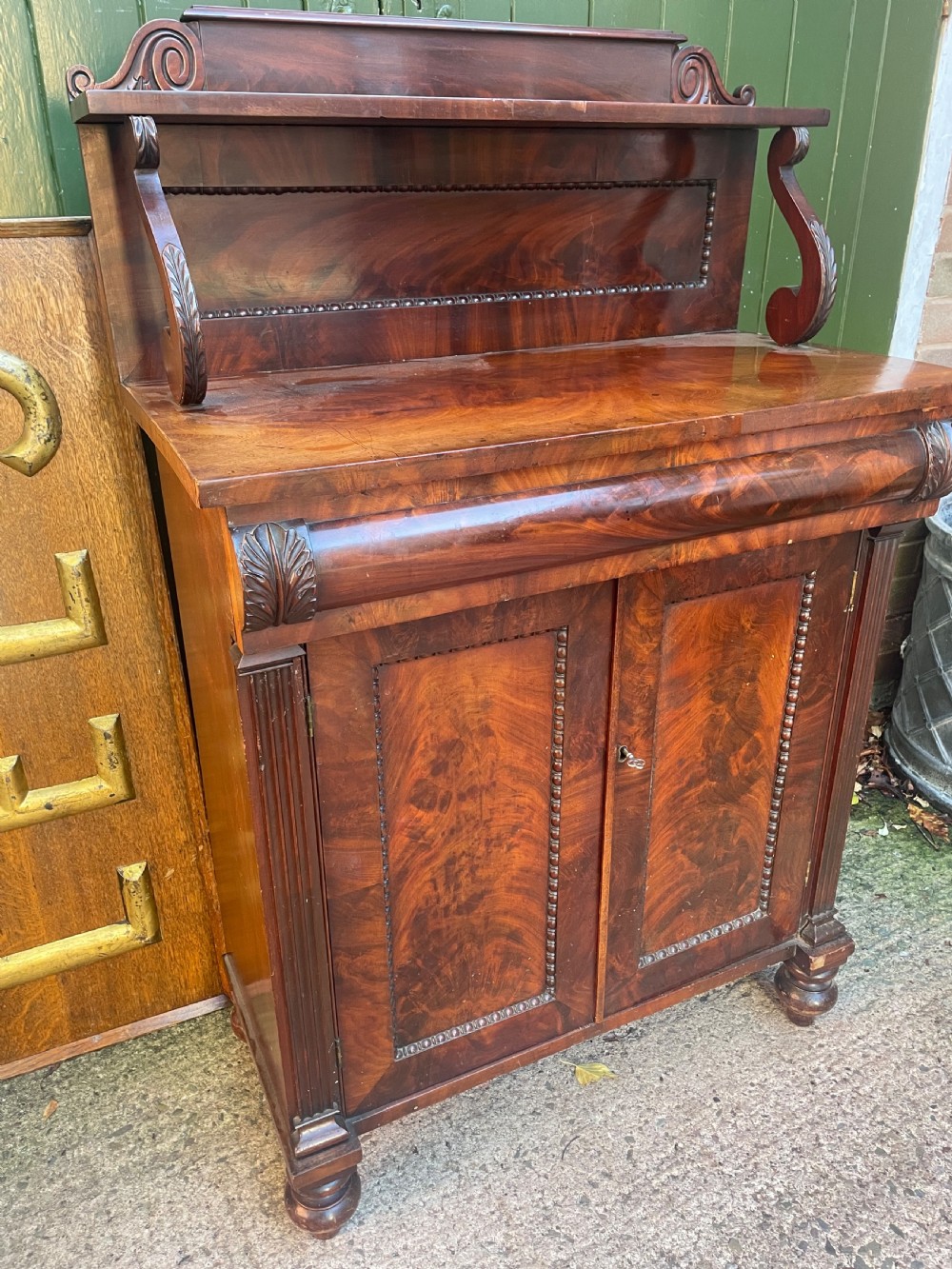 early c19th george iv period figured mahogany chiffonier of unusually small scale and proportions