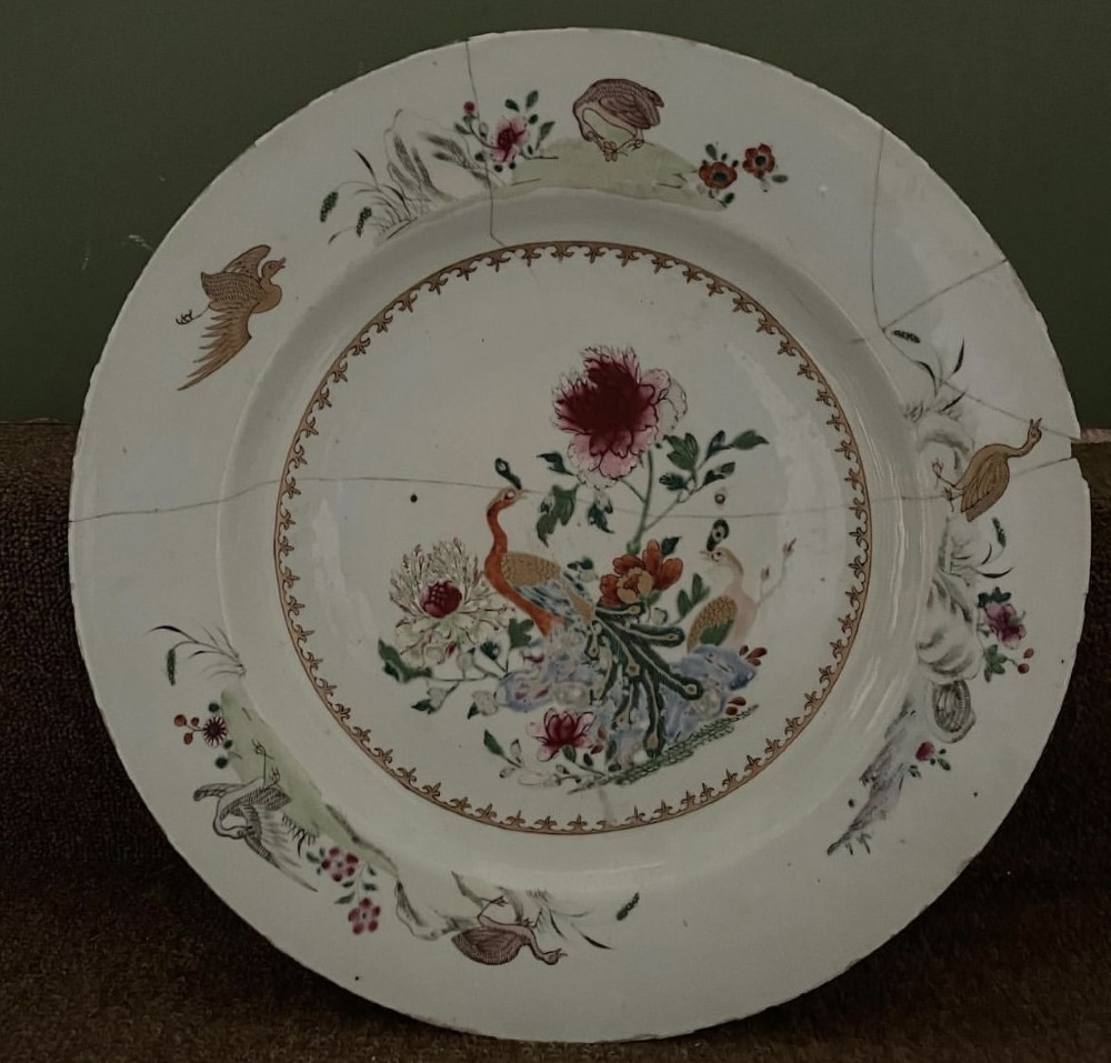 large c18th chinese qianlong period porcelain charger with rivetted repairs