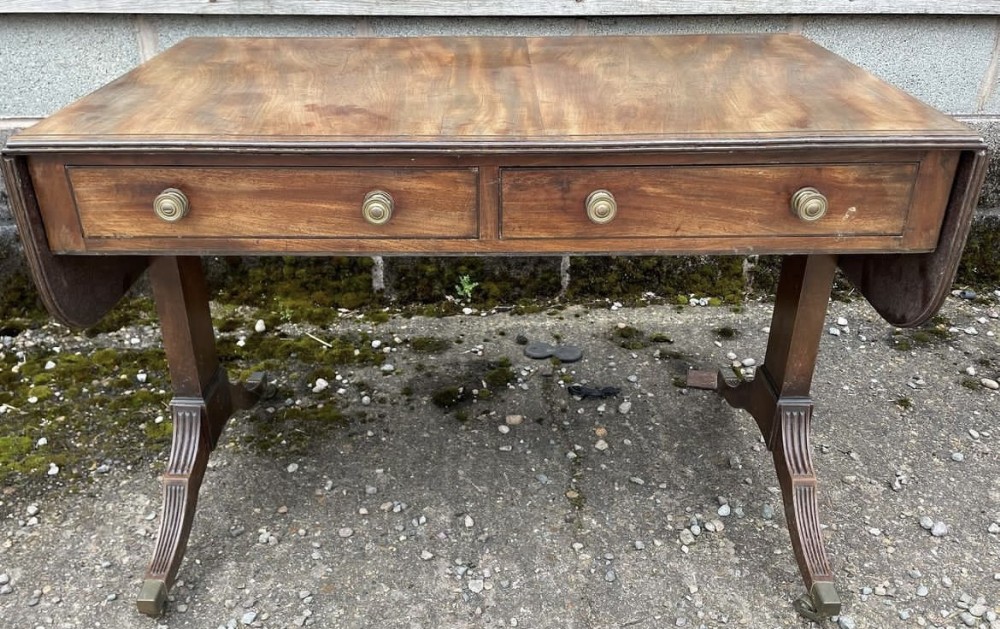 elegant early c19th regency period mahogany sofa table of restrained design