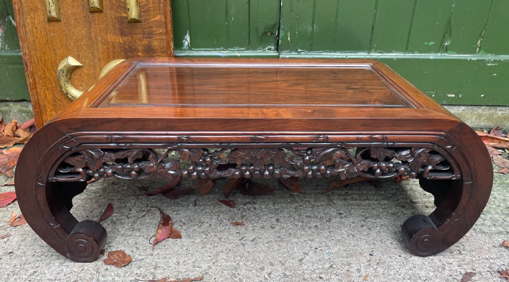 late c19th early c20th chinese qing dynasty carved huali scrollend kang or opium table