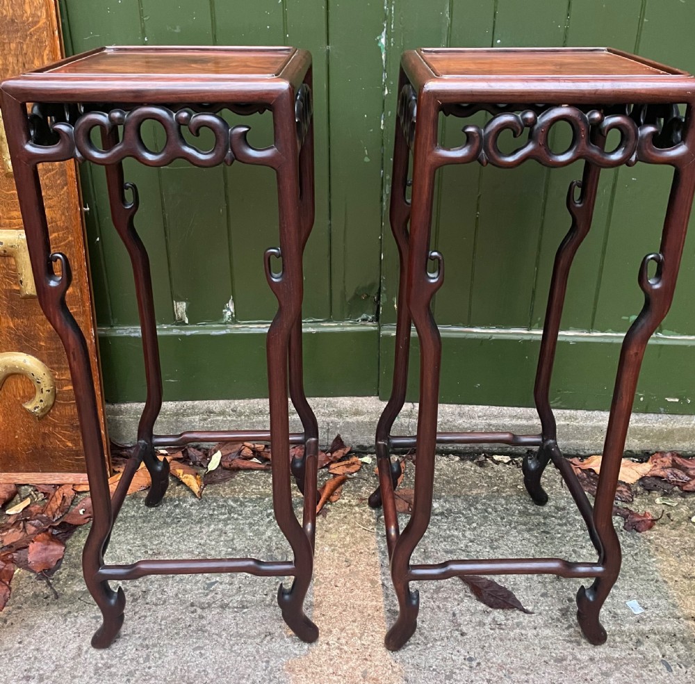 elegant and stylish pair of late c19th chinese qing dynasty carved hardwood huali vases stands or tables