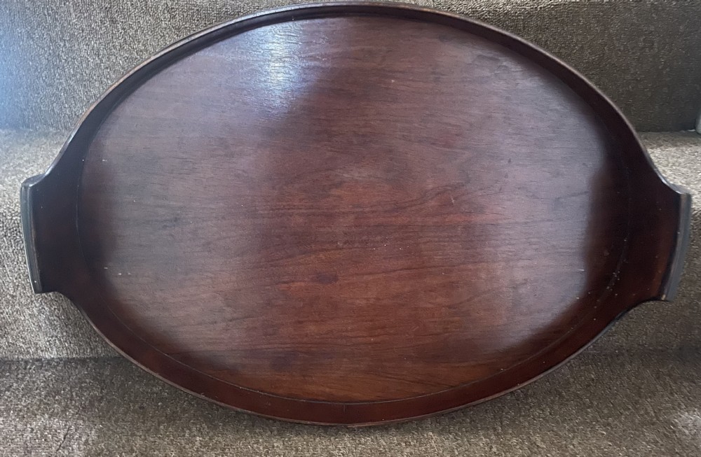 early c19th oval mahogany brassbound tray