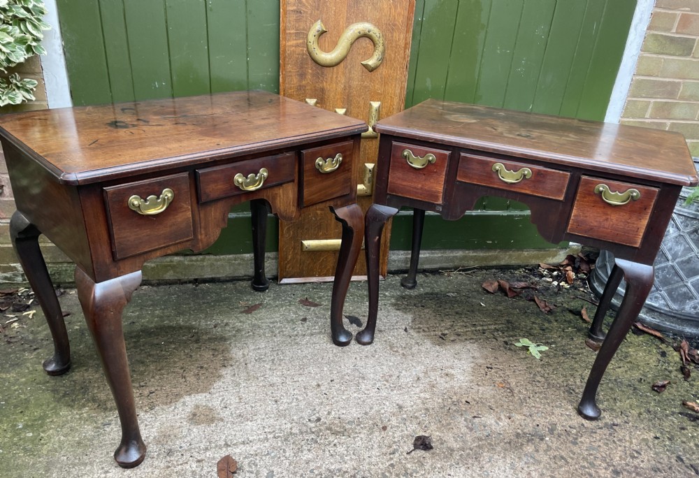 rare matched pair of mid c18th george ii period mahogany cabrioleleg lowboys
