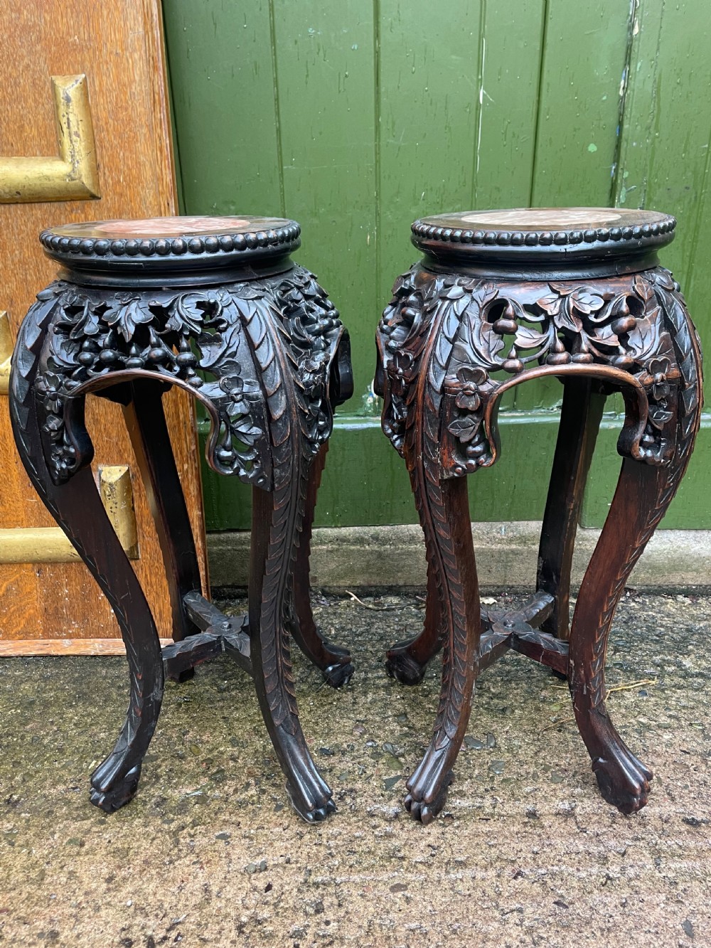 pair of late c19thearly c20th chinese qing dynasty carved hardwood vases stands