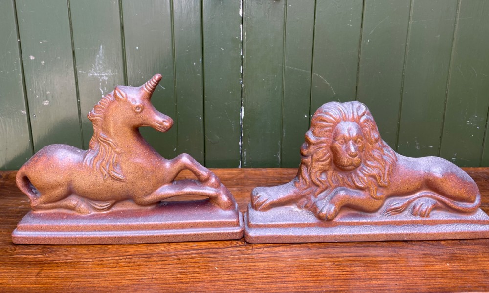 pair of c19th saltglazed stoneware ornamental studies of the lion and unicorn representing the union of england and scotland