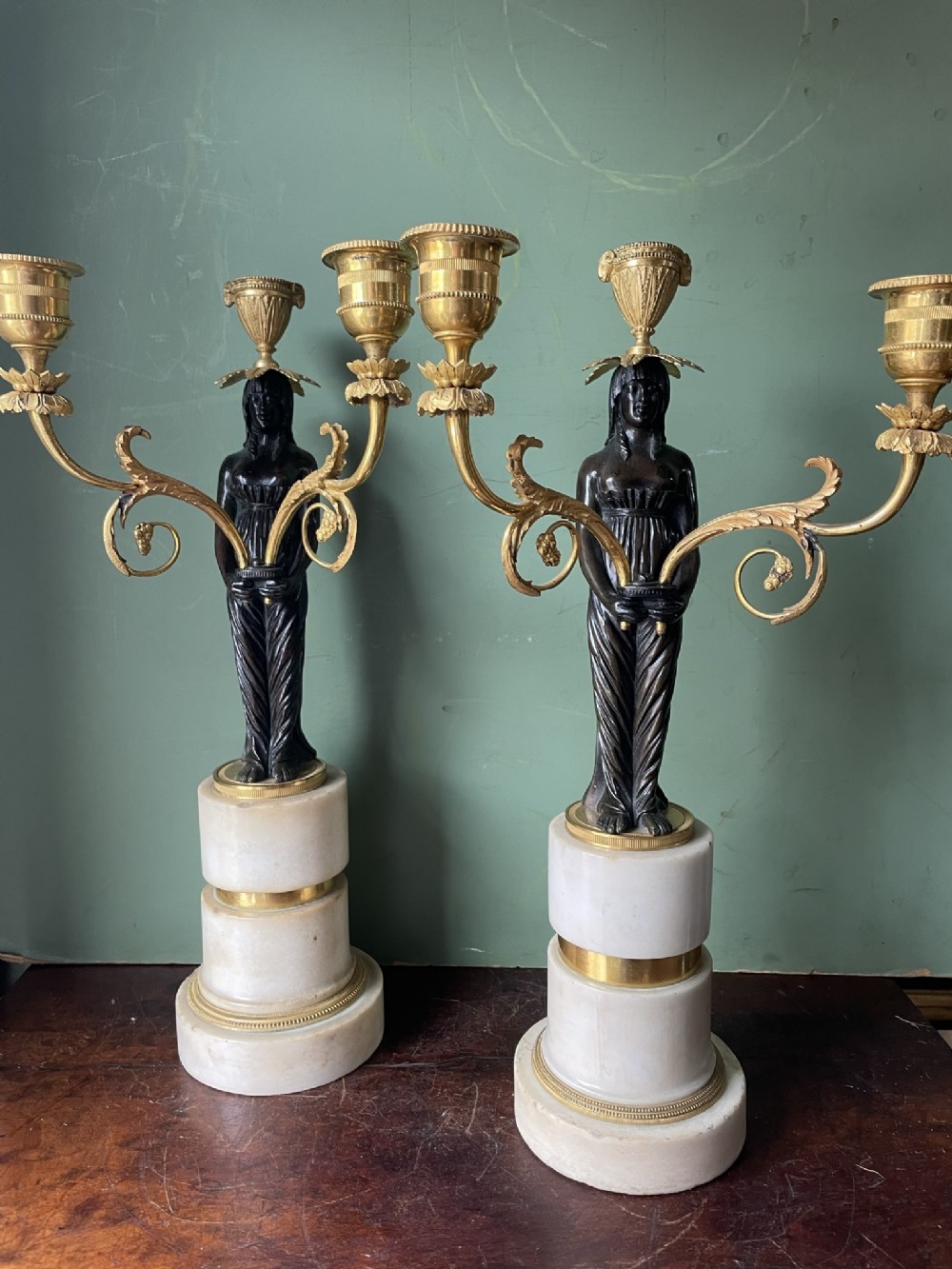 fine quality pair of early c19th empire style bronze and ormolu bronze candelabras