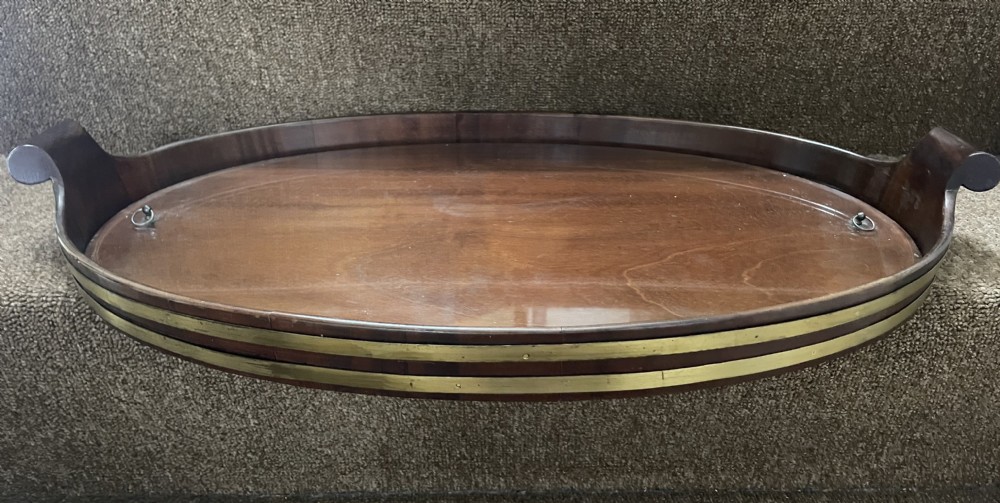 late c18th early c19th oval mahogany brassbound tray with a removable bespoke glass liner