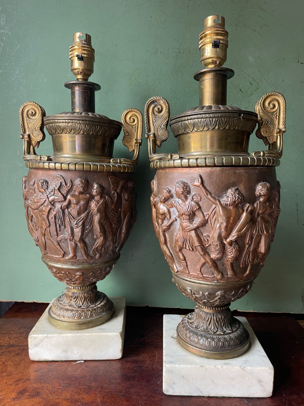 pair of late c19th gilded and patinated brass table lamps modelled in the grand tour taste in the form of ancient classical volute krater vases