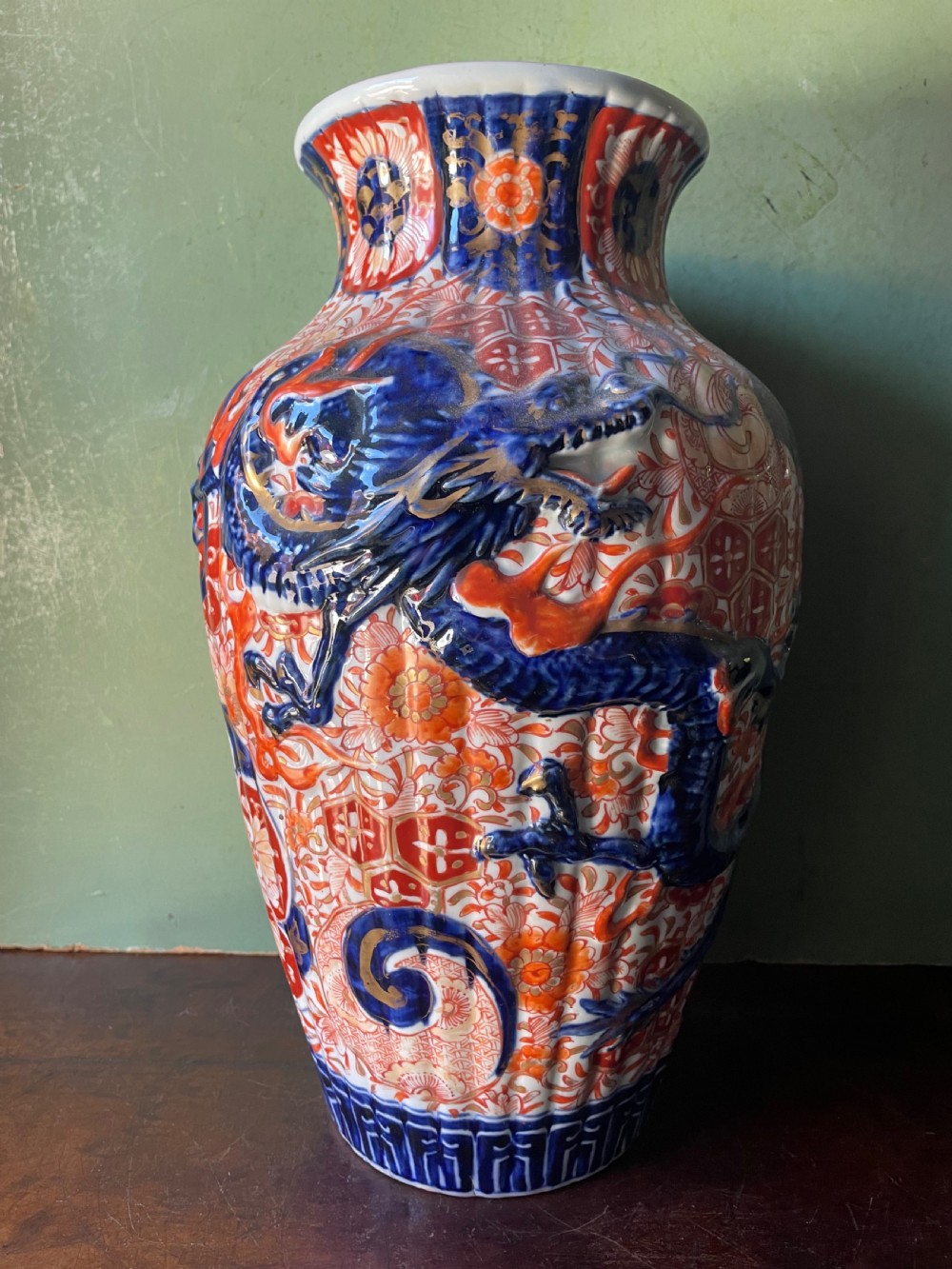 late c19th japanese imari porcelain baluster vase with raised highrelief coiled dragon decoration