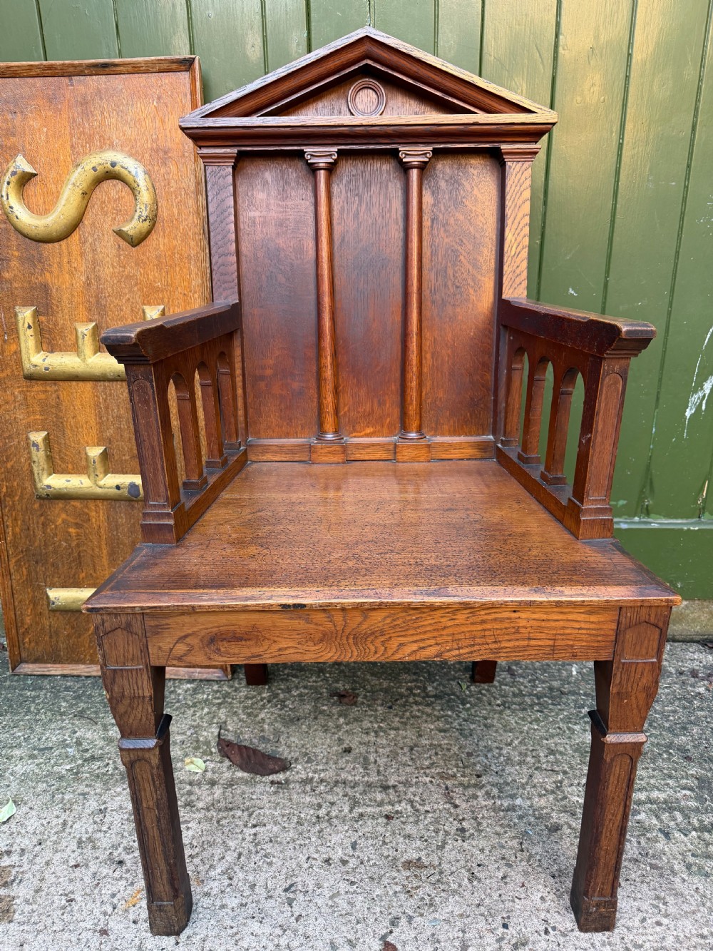 interesting mid c19th oak armchair with an architectural palladian style classical back back