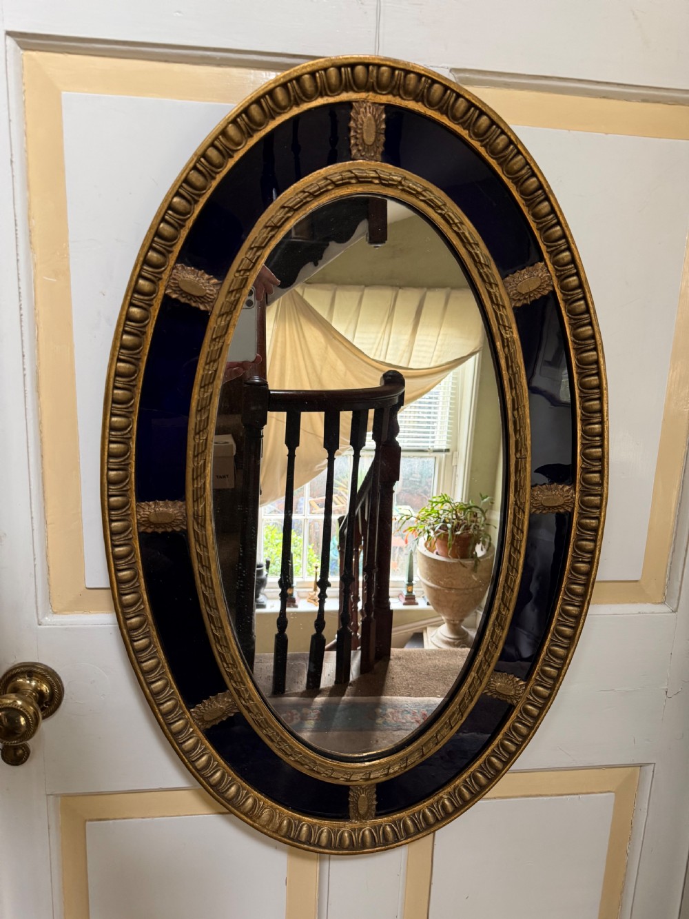 decorative early c20th blue border glass oval giltwood framed mirror in the late c18th style