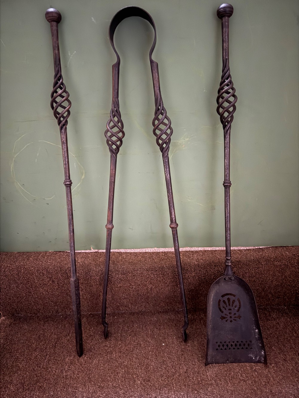 set of 3 late c18th early c19th forged steel fireirons or tools with an open basketwork spiral design detail
