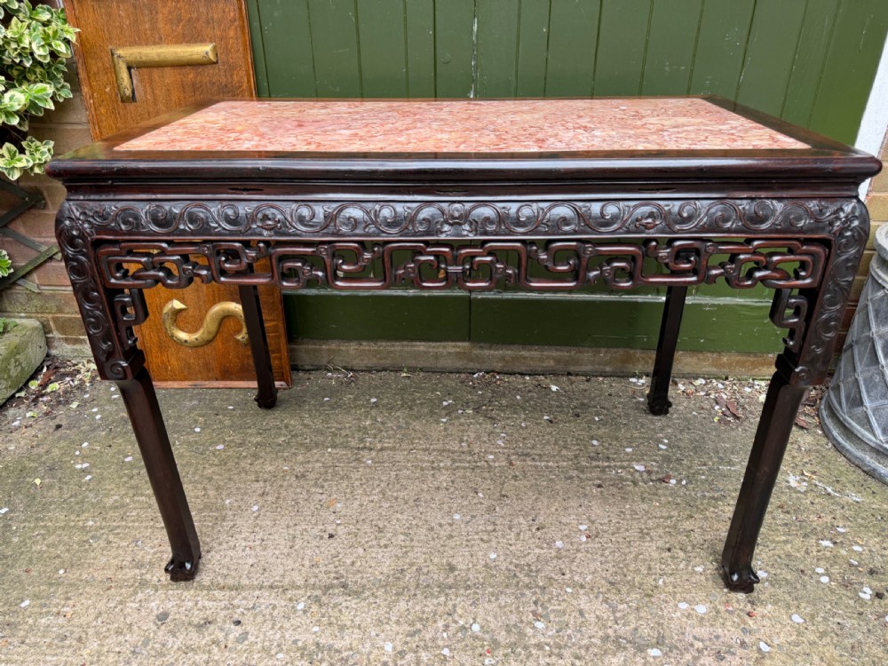 late c19th chinese qing dynasty carved hardwood rectangular centre table with inset rouge marble panel top