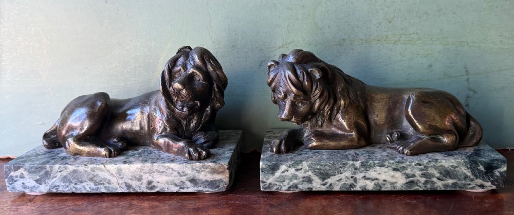 pair of early c19th regency period bronze lions on antico verde marble bases