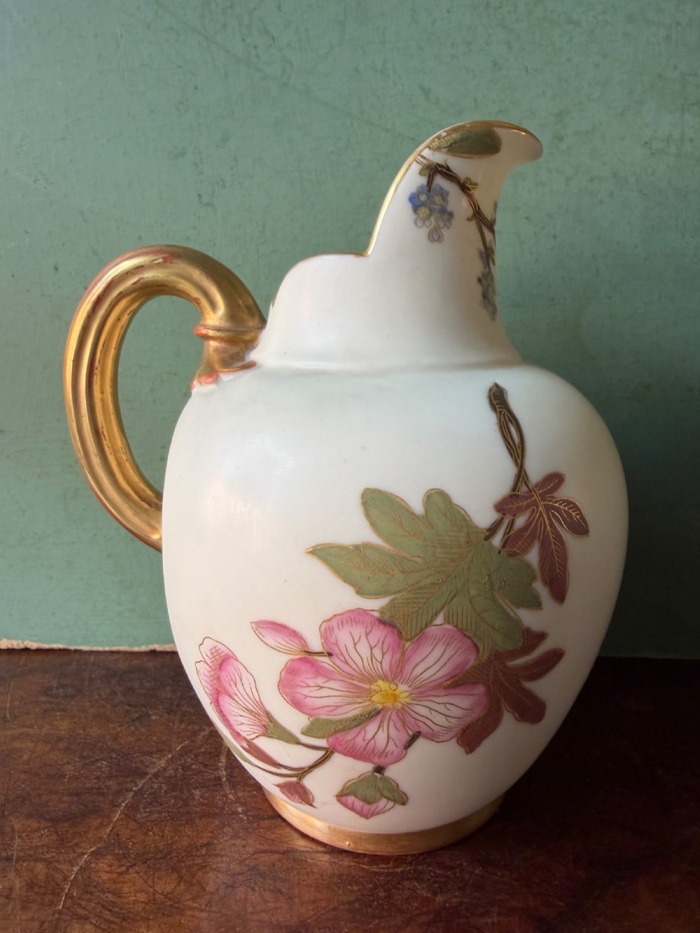 late c19th royal worcester porcelain pale ivory ground floral decorated flatback jug