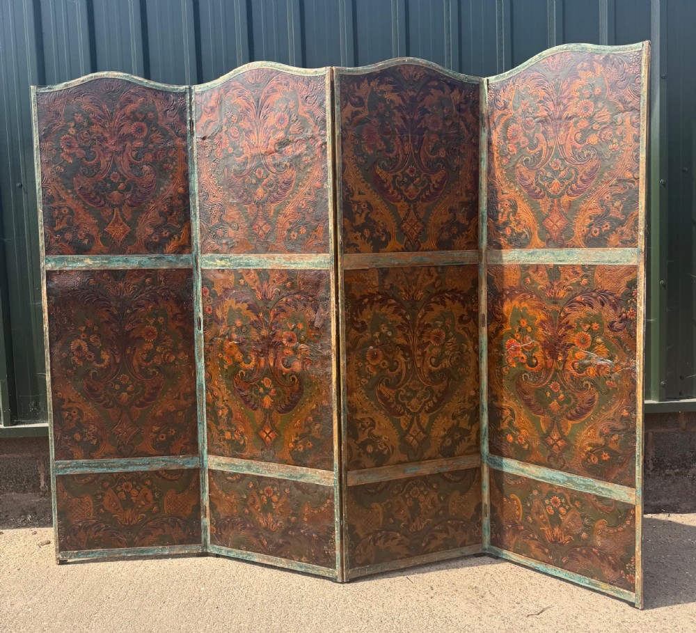 large late c19th polychrome decorated fourfold countryhouse canvas screen or room divider in the manner of c18th dutch tooled leather