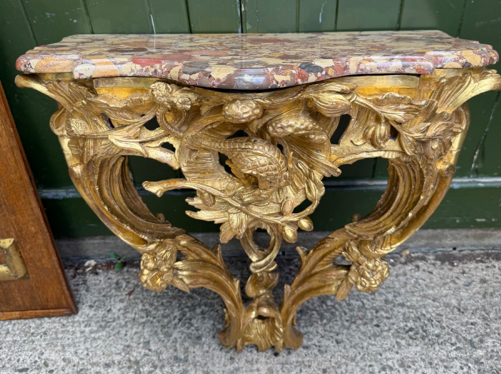 late c18thearly c19th french carved giltwood console table with a breche dalep figured marble top