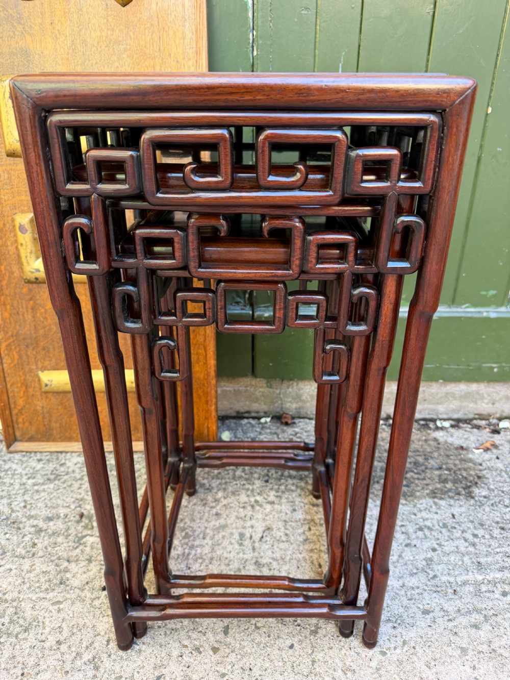 set of 3 late c19th early c20th chinese qing dynasty carved hardwood nesting or stacking graduatedsize occasional tables