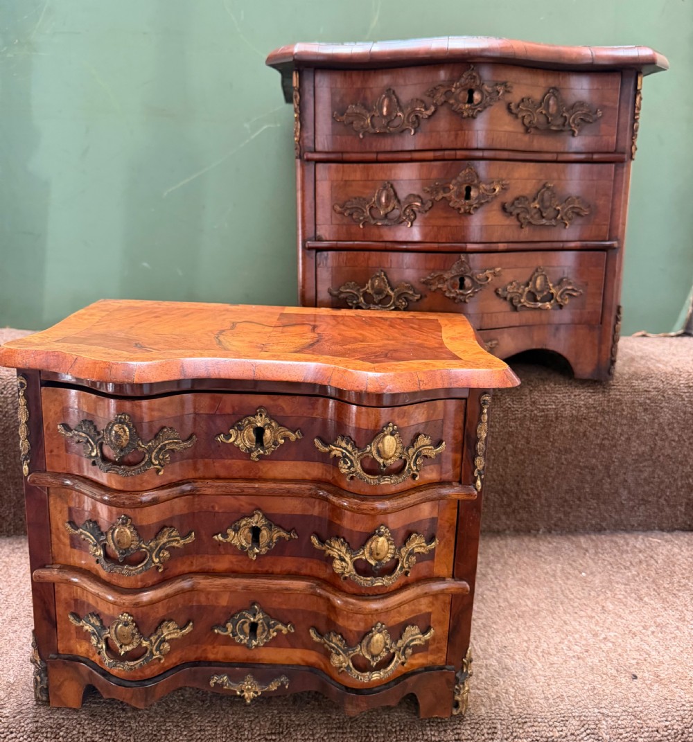 complimentary matched pair of late c19th french miniature ormolumounted walnut commode chests